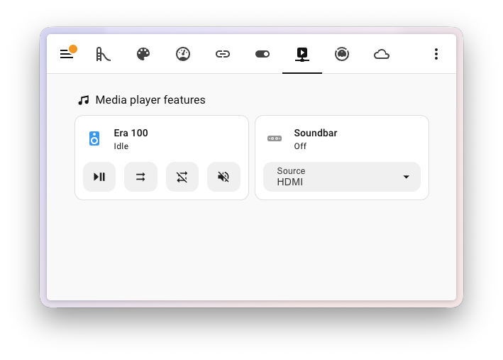 Screenshot of a media player tile card showing the new mute, shuffle, repeat, and volume controls together with a filtered source dropdown